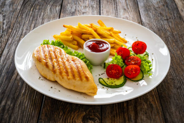 Chicken steak (Grilled chicken breast with vegetable and french fries)